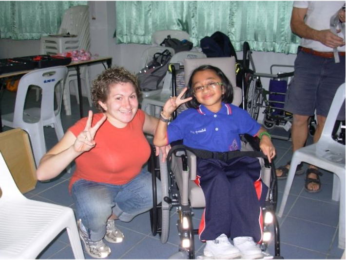 Woman and child in a wheelchair